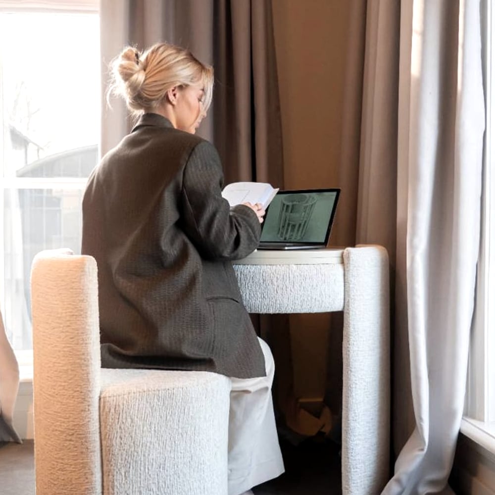 Used as a desk with a laptop